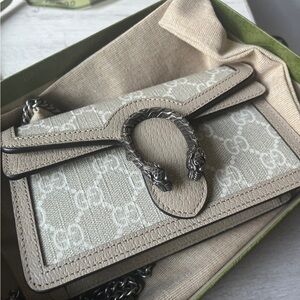 Authentic Gucci chain wallet .